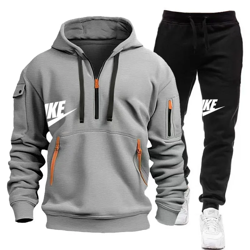 Conjunto deportivo informal para hombre con sudadera con capucha multibolsillos y pantalones deportivos en estilo otoño-invierno.
