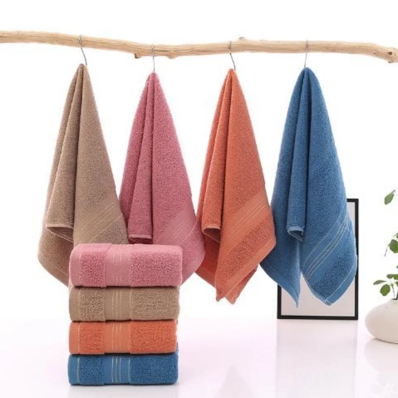 

Plain cotton towels with gold edge, soft and absorbent, family pack of 4 pieces