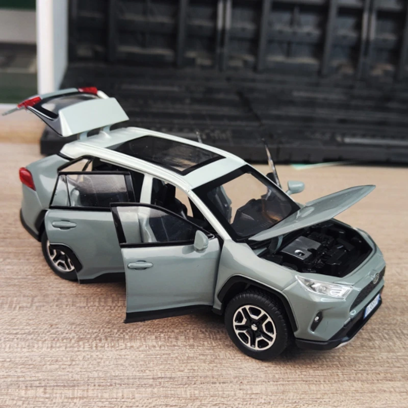Modèle De Voiture Fini à L'échelle 1:32 Pour Toyota RAV4 SUV Voiture En Alliage Moulé Sous Pression Modèle En Métal Simulation Sonore Collection De Lumière Jouet Cadeau Miniature Réplique Voiture
