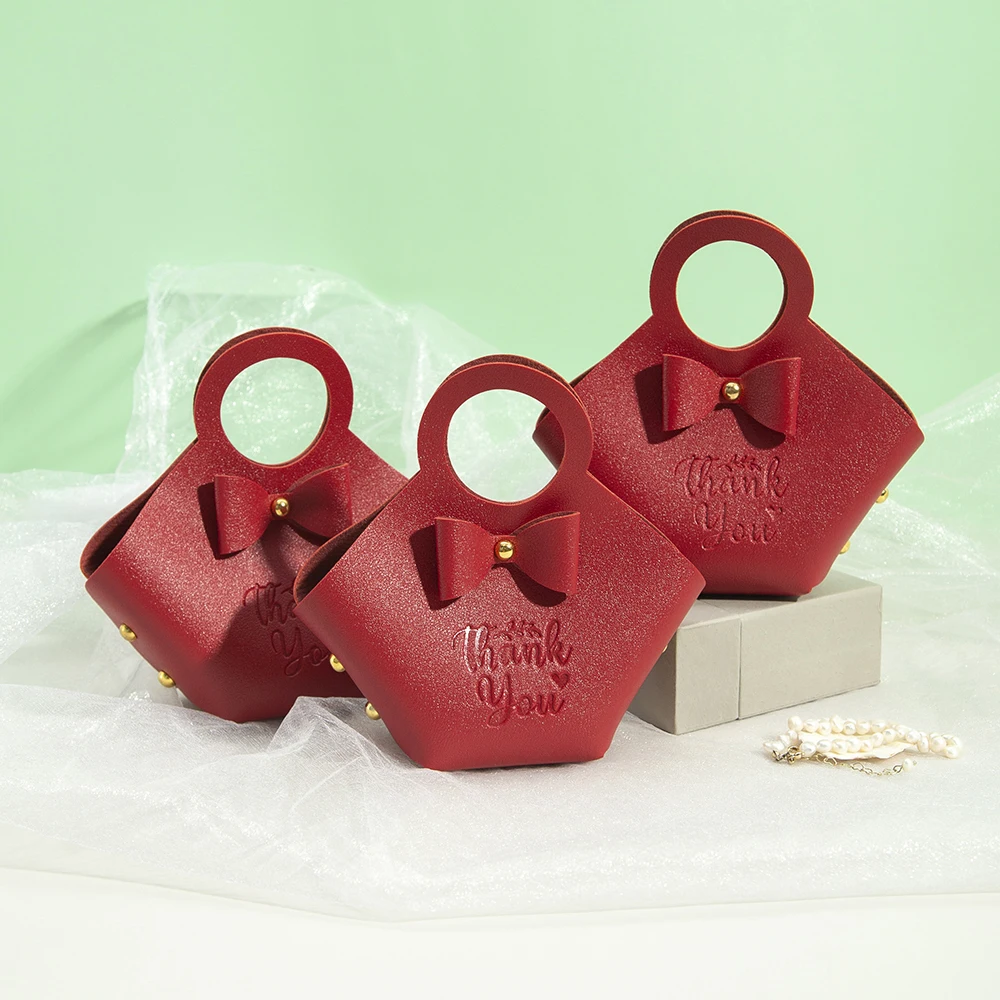 Weihnachten rote PU-Leder Schmuck Süßigkeiten Tasche Box 16x9x7cm Hochzeit Süßigkeiten Schokolade Handtasche mit Schleife Seife Parfüm Strumpf Beutel – Detail 10