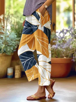 Pantaloni estivi in lino da donna Pantaloni Boho a gamba larga Pantaloni palazzo larghi Pantaloni floreali con coulisse e tasche 1