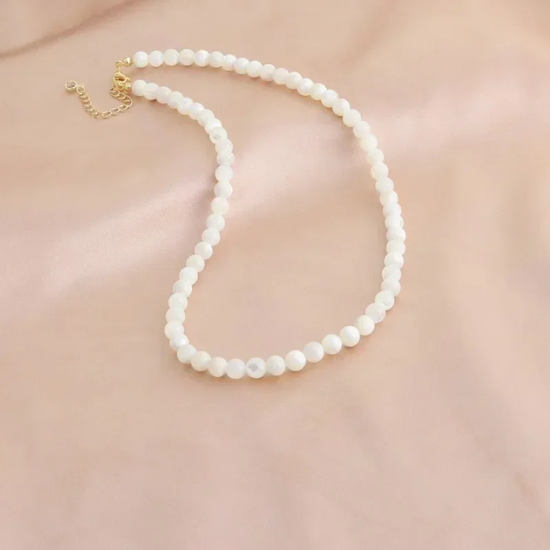 Minar Elegant Natural Shell Beaded Necklace with Silver-Plated Chain