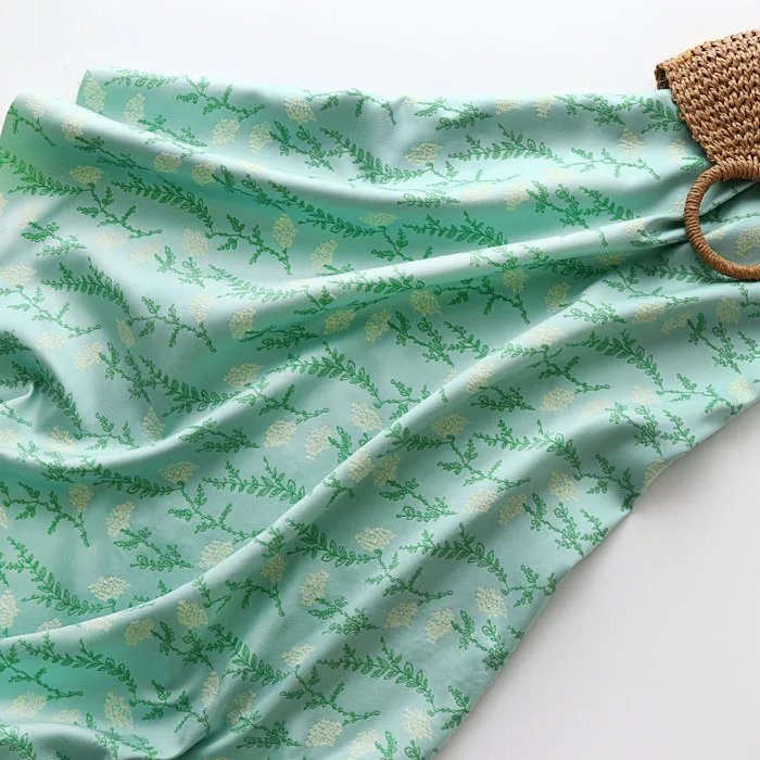 

Yarn-Dyed Jacquard Fabric Green Embossed Floral Dandelion Fabric Clothing Bag Fabric Chinese Style