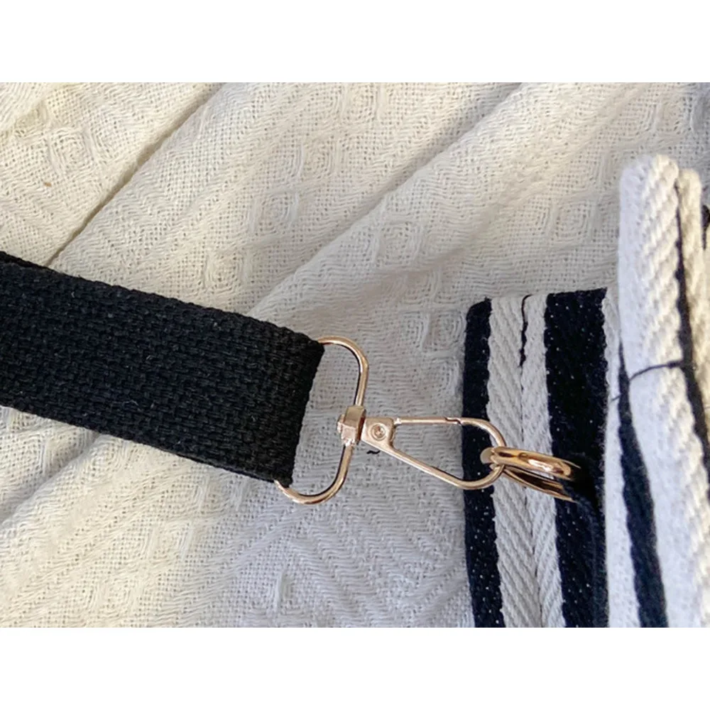 Popular striped canvas 2024 new commuter large capacity casual fashion personalized hand-held crossbody tote women's bag_voghion.com
