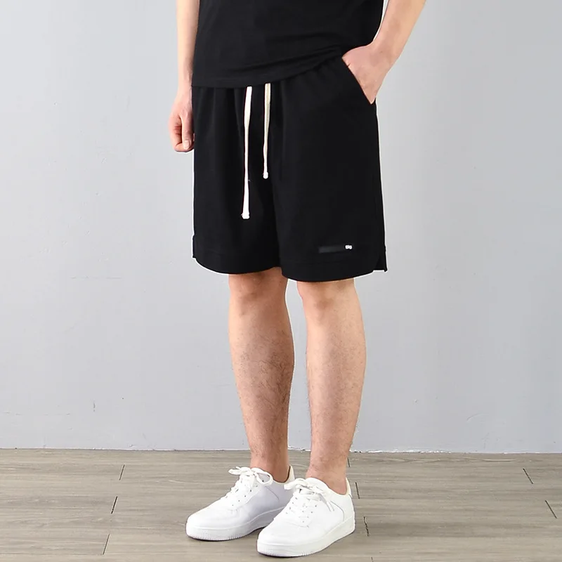 2022 Spring and Summer New Casual Shorts Sports Pants Men's Solid Color five-point Pants Beach Pants Men's Fashion Shorts