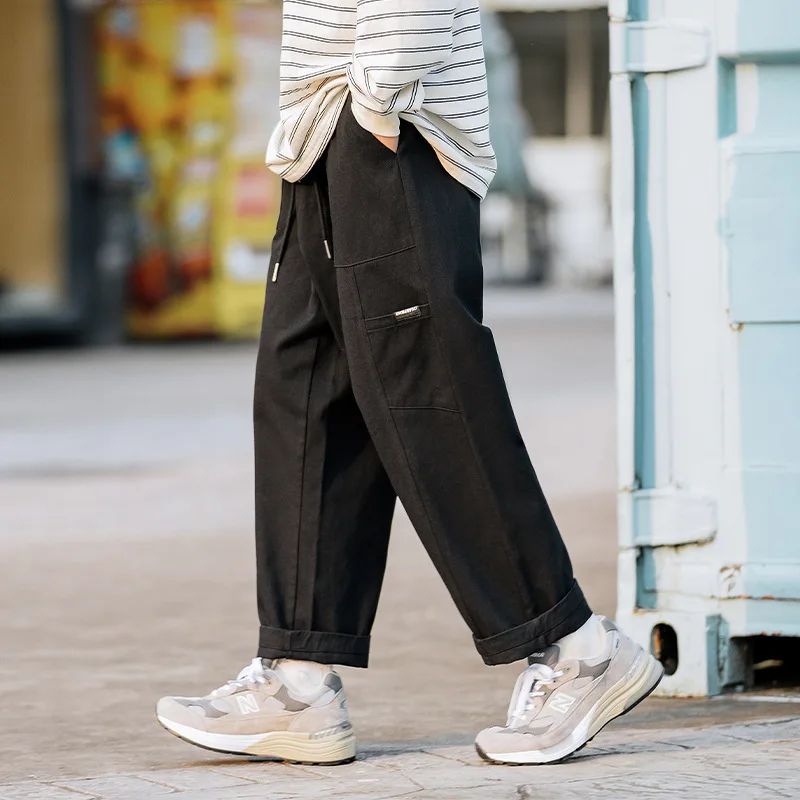 Work casual pants straight tube splicing patch pocket design feeling long cargo pants men baggy pants