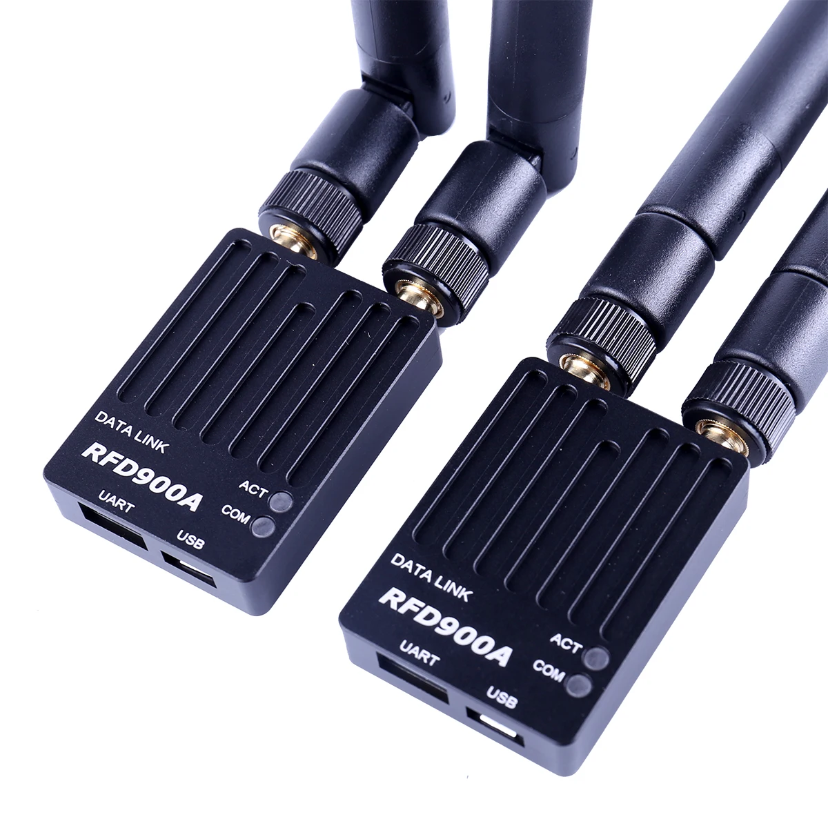 Deux modules télémétrie RFD900X 915MHz SBUS pour drone FPV, prêts pour communication longue distance.