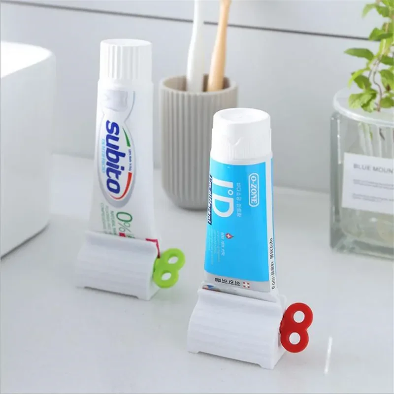 Toothpaste Squeezer Rolling Tube Toothpaste Seat Holder Stand Rotate Facial Cleanser Squeezing Dispenser Bathroom