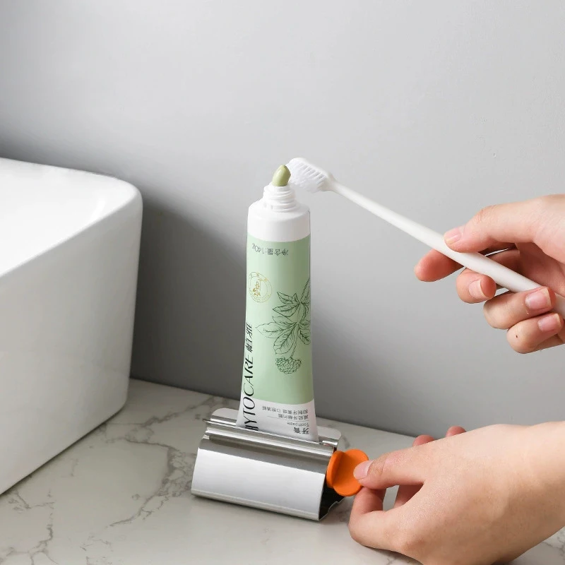 1pc Stainless Steel Wringer Roller Rotate Dispenser for Ointments Cosmetics Bathroom Accessories Toothpaste Squeezer Tube Roller 2