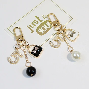 Luxury Handbag Pendant Keychains Fashion Pearl Number 5 Tassel Keyring for Women Bag Ornament Car Key Chains Jewelry Accessories