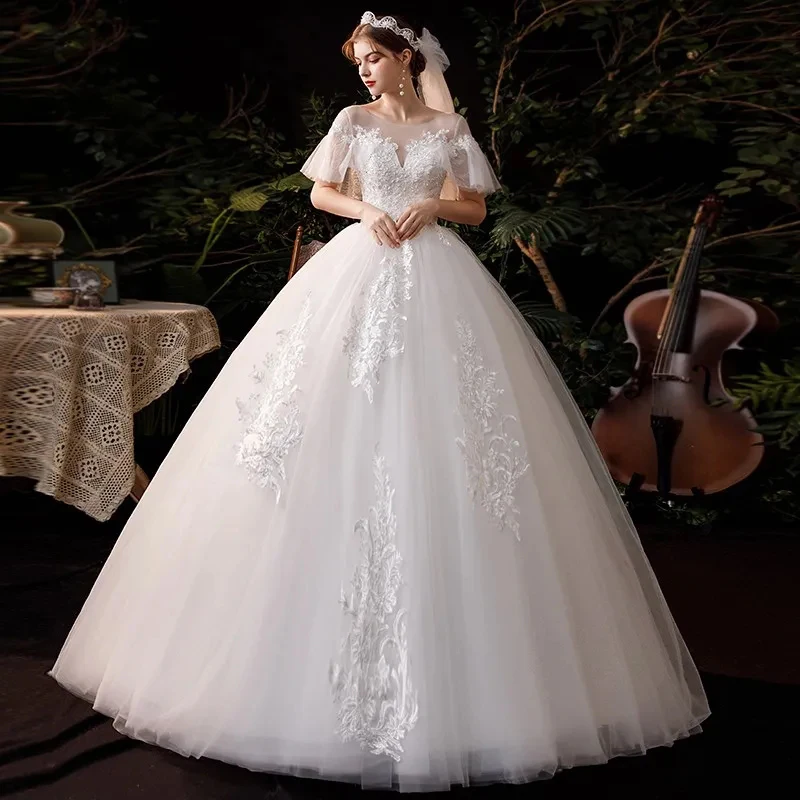 

Princess Ball Gown Wedding Dresses Graceful Bridal Gown Sheer O-Neck Lace Appliques Tulle Cap Sleeves Vestidos De Novia