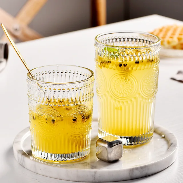 300ml/350ml Bicchieri da bere eleganti Modello di girasole Tazza di vetro in rilievo Bevanda trasparente Tazze per bevande fredde Tazze di birra al whisky 2