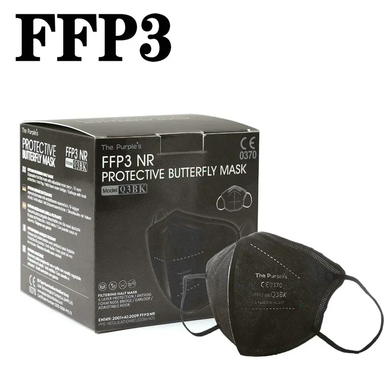 Masque de protection respiratoire plié, vue de côté montrant les plis et les élastiques.