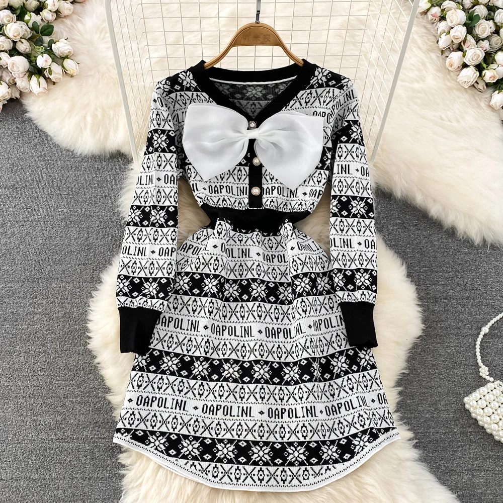 

Xiaoxiangfeng bow V-neck waist slim A-line dress female celebrity temperament high-end long-sleeved knitted skirt