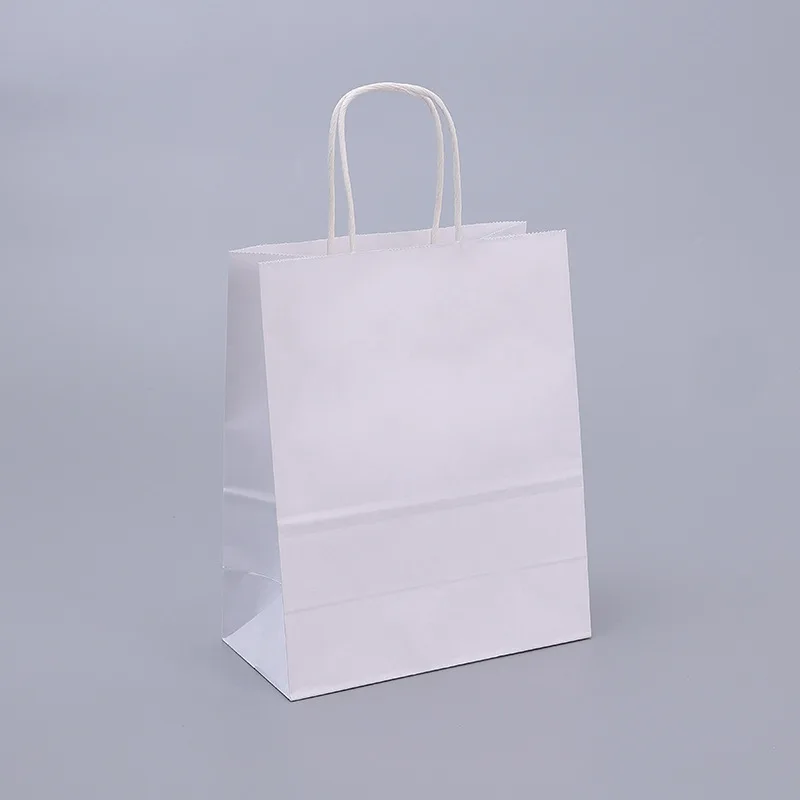 thumbnail image 1 of 10/20/30/40/50 piezas/lote de bolsas de papel Kraft con asas, bolsas de embalaje de regalo para tienda, ropa, suministros de boda y Navidad, kit de bolsos, 1 of 4