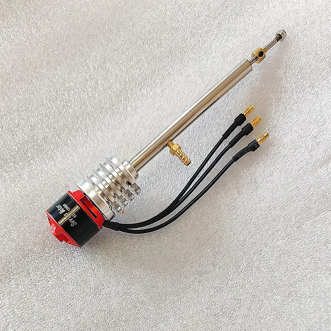 Moteur brushless 1000KV posé sur fond blanc, roulement NMB apparent, finition métallique brillante