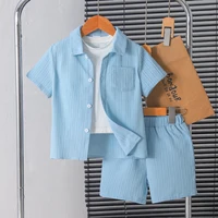 New summer men's short-sleeved woven pure blue button pocket + loose shorts two-piece set 1