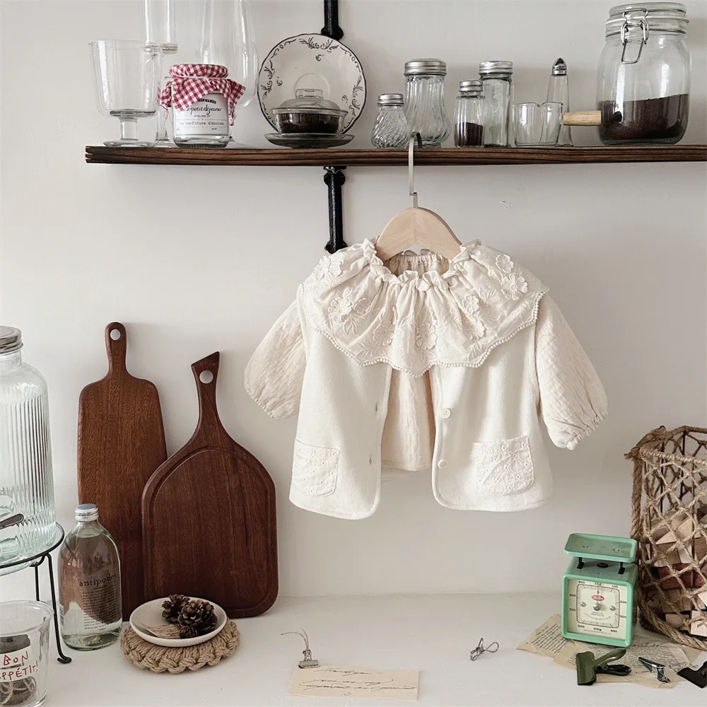 Description Picture 4 of item2025 Spring New Baby Sleeveless Vest Solid Infant Cotton Cardigan Toddler Lace Vest Coat Simple Single Breasted Baby Clothes