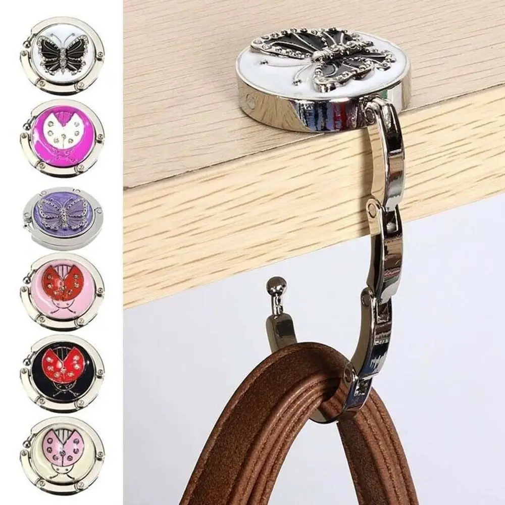 1Pcs Round Metal Hanger Hook Holder Unique Folding Portable Butterfly Pattern Fashion Table Hook Crystal Alloy Purse Handbag Bag bag hanger self adhesive wall hooks magnet hooks adhesive hooks suction cup hook kitchen hooks wall mount hooks self adhesive hooks adhesive wall hooks coat hook aluminum alloy buckle hook