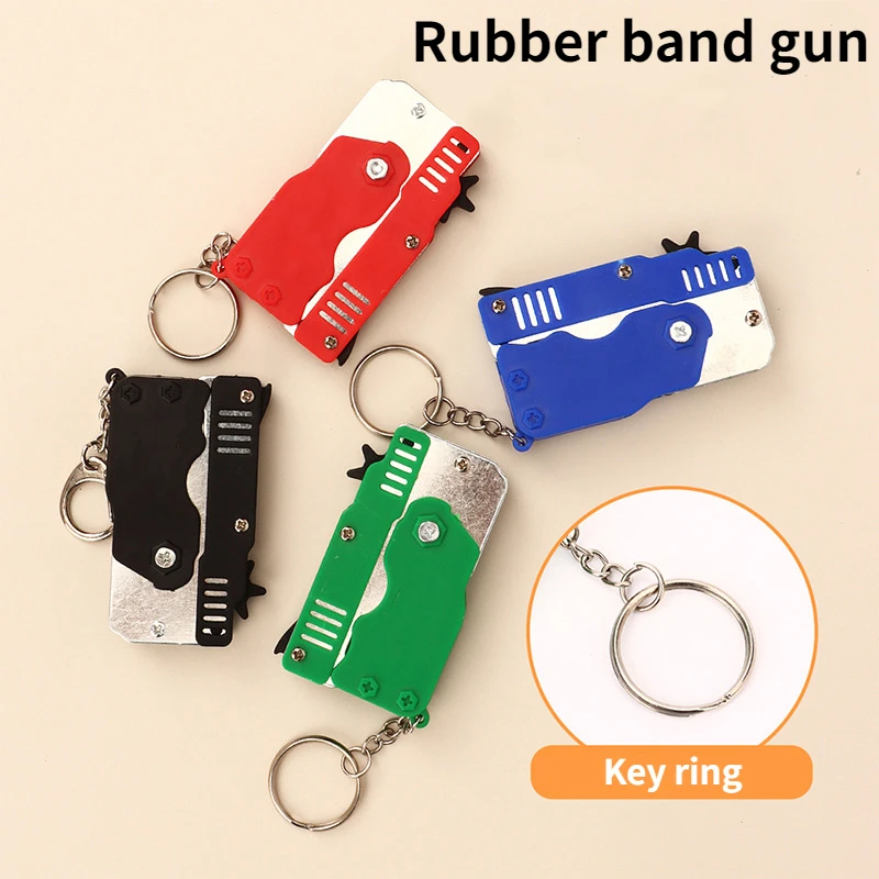 Universal Mini keychain Car Keychain Toy Gun Shooting Pistol Kid Outdoor Party Folding metal gun gift Car Styling Keyring