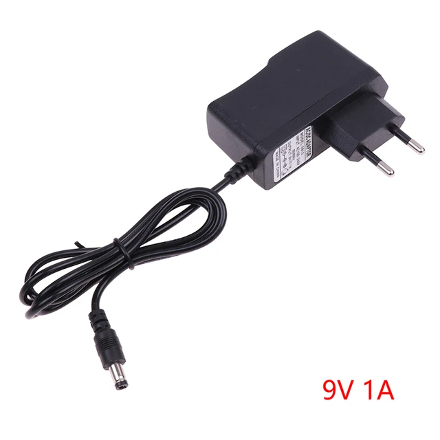 AC DC 9V 1A 1000ma alimentatore spina ue adattatore per caricabatterie a  polarità inversa convertitore AC 100V-240V interruttore interno negativo -  AliExpress