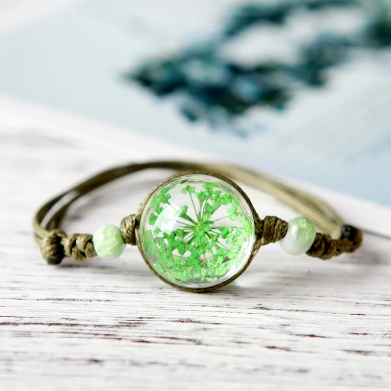 

Qinghai characteristics handmade small fresh literary fan dried flower plant specimen bracelet full of stars bracelet ceramic gi