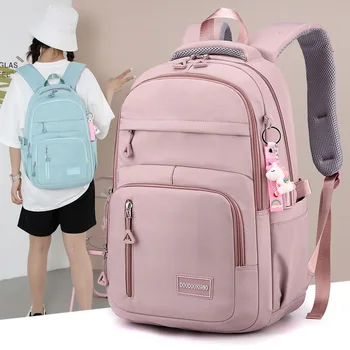 Borsa da scuola per ragazze con ciondolo zaino in Nylon zaino da viaggio Multi tasche impermeabile Casual stile semplice zainetto per adolescente 1