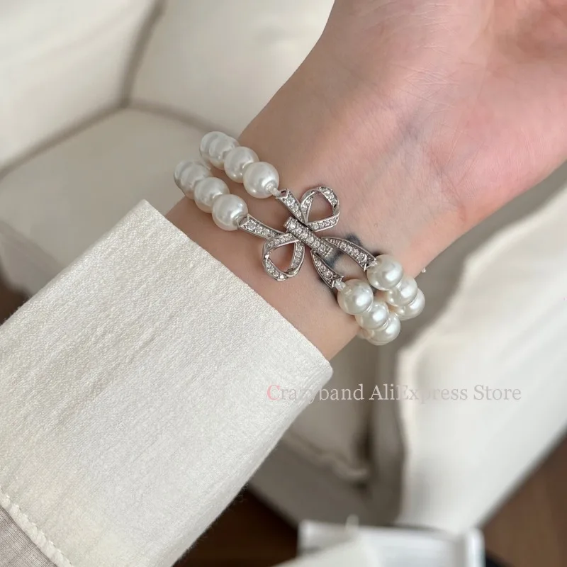 2025 جديد القوس تمتد مطرز حزام ساعة نسائية حزام لس...