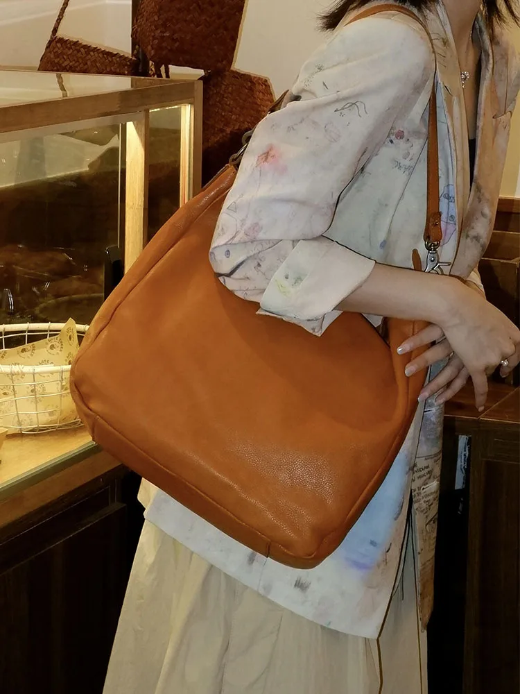 PNDME Vintage hochwertige Oberschicht Rindsleder Damen Umhängetasche Outdoor Pendeln echtes Leder große Kapazität Unterarmtasche