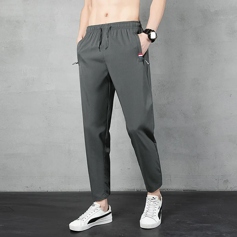 Spring and Autumn Men\'s Elastic Belt High Waist Solid Color Drawstring Panel Contrast Pocket Harun Nine Point Trousers Pants