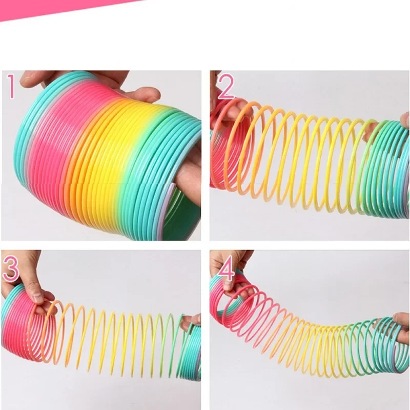

Early development education for toys, creative magic toys for children, colorful rainbow rings, fun magic folding plastic spring
