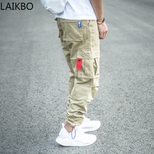 

Streetwear Fashion Men Jeans Loose Fit Multi Pockets Casual Cargo Pants Drawstring Designer Hip Hop Joggers Wide Leg Trousers