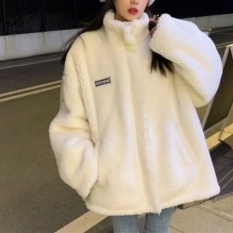 

2023 Autumn and Winter Women's Standing Collar Pulling Pocket Plush Thickened Imitation Lamb Plush Fashion Casual Elegant Coat