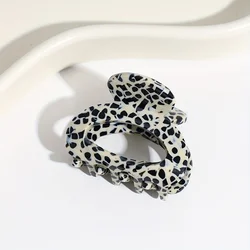 Chic Oval Hair Claw Clip - Secure Grip Accessory - Size fits all (Black White Color)