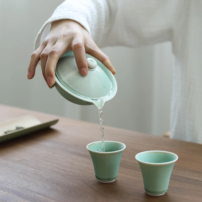 

Sodagreen kiln glaze grab pot creative ceramic Kung Fu teapot single bubble teapot trumpet home tea set teapot.