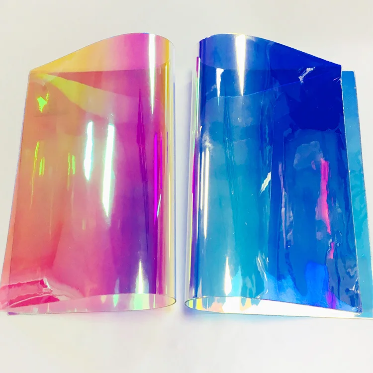 

Magic Bright Color Colorful PVC Transparent Holographic Faux Leather Fabric Sheets for Umbrellas HandBags Keychains DIY Crafts