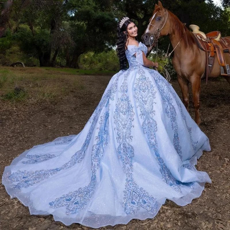 

Light Blue Off The Shoulder Bow Ball Gown Quinceanera Dresses Sequined Appliques Lace Corset Vestidos De 15 Años