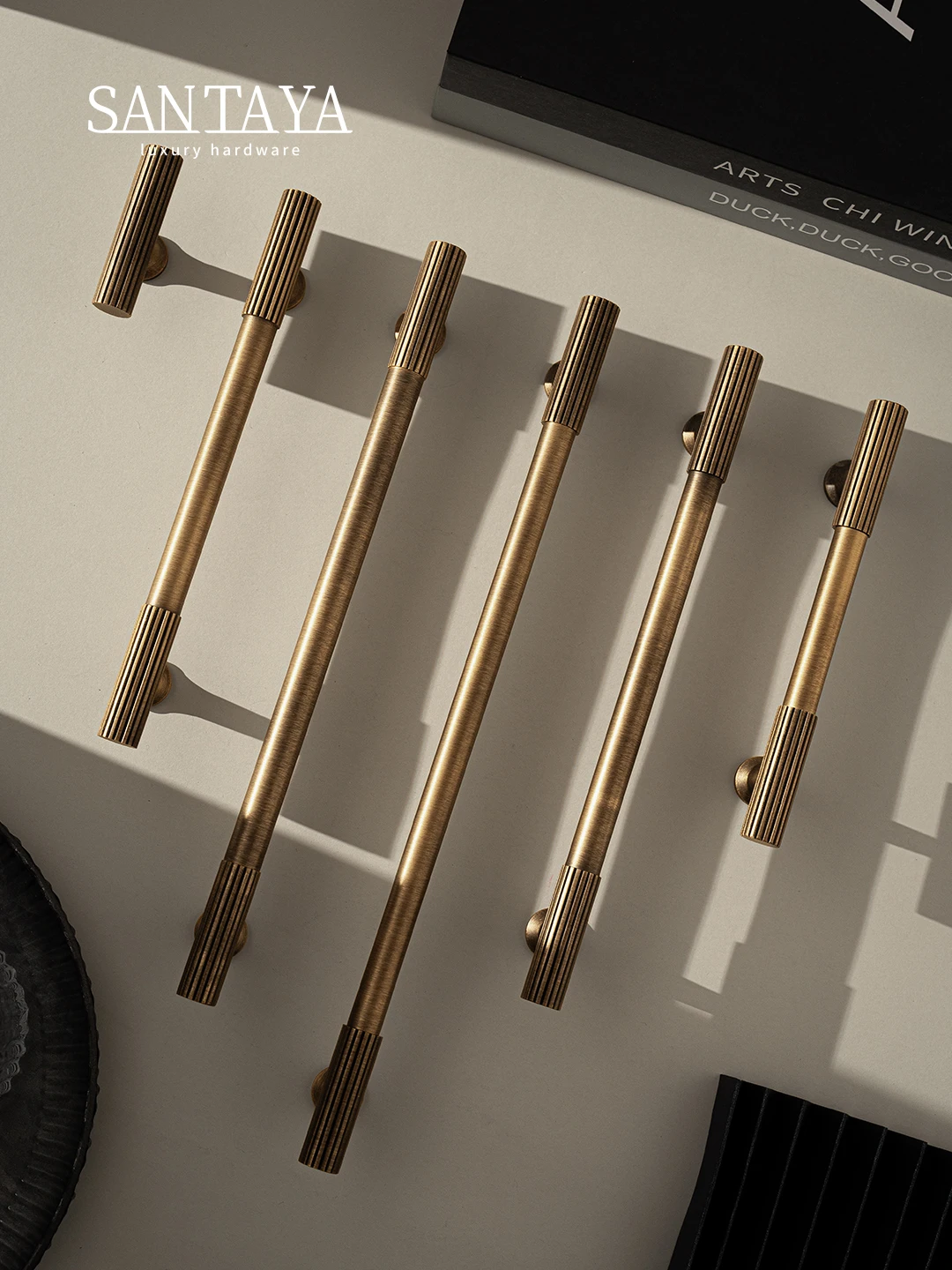 Santaya ทองเหลืองโบราณจับถัก Ribbed ห้องนอนตู้เสื้อผ้าตู้ครัวดึงยาว T-bar ลิ้นชัก Knobs Bronze Handle 1