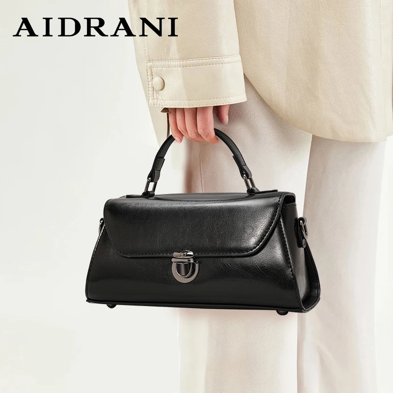 Aidrani  Elegant and minimalist women's handbag made of high-quality cowhide with tassels and ribbons main image 1