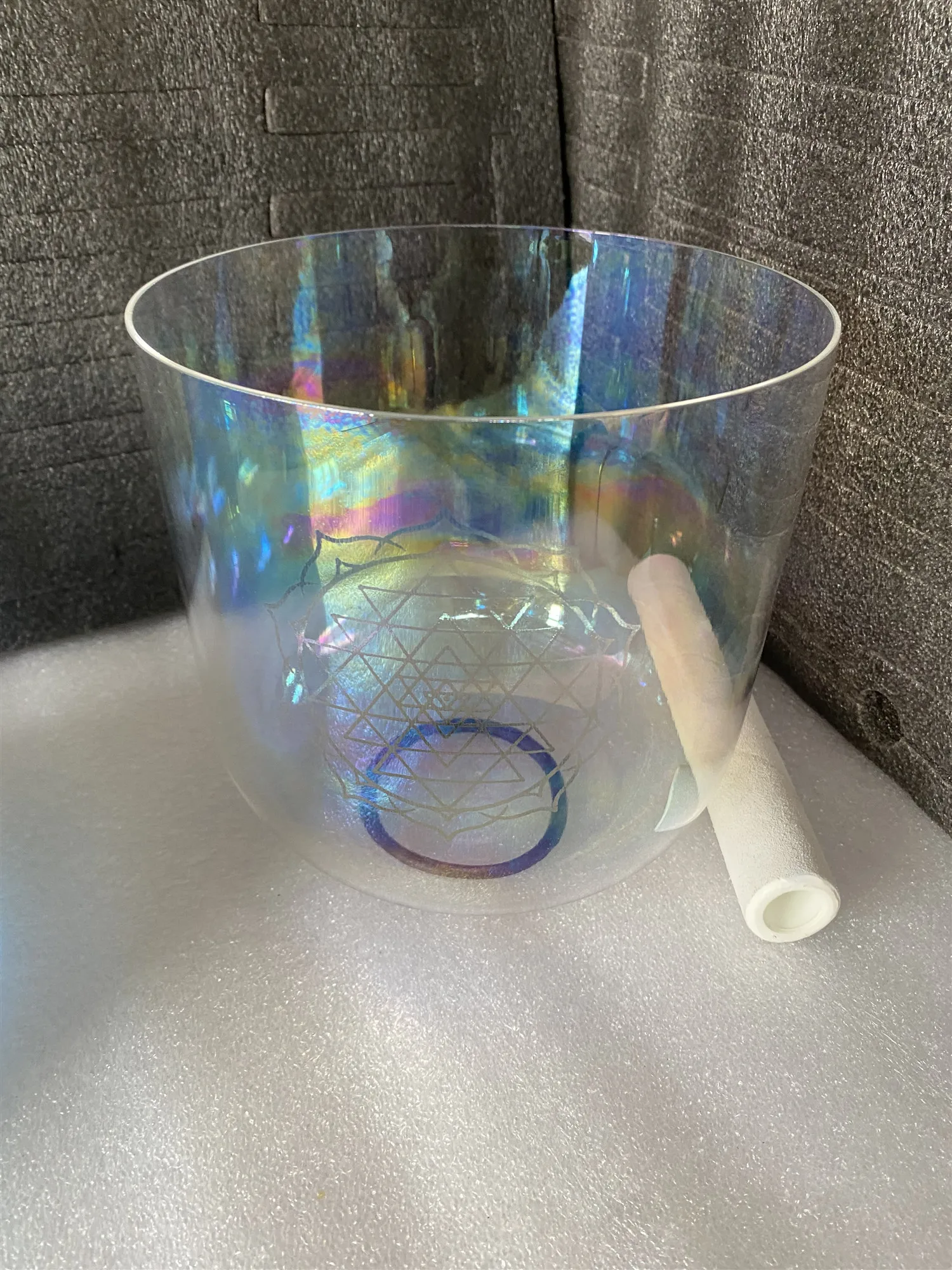 Heart chakra Crystal singing bowl 3rd octave F note clear cosmic color with "shri yantra" engraving for sound healing.