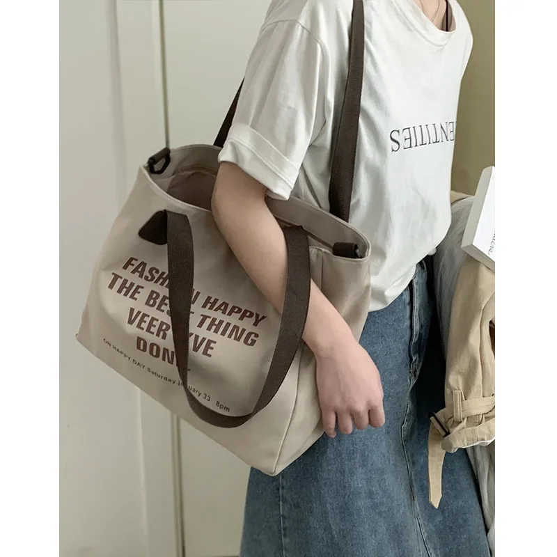 

Multi-pocket Large-capacity Tote Canvas Bag Minimalist School Bag Hand-held Shoulder Crossbody Bag for Men and Women