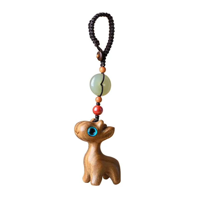 Handgemaakte houten steenuil sleutelhanger Handgemaakte houten steenuil sleutelhanger