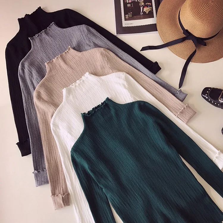 

2023 Autumn/Winter New Korean Women's Fashion Wooden Ear Edge Standing Neck Tight Bottom Knitted Sweater