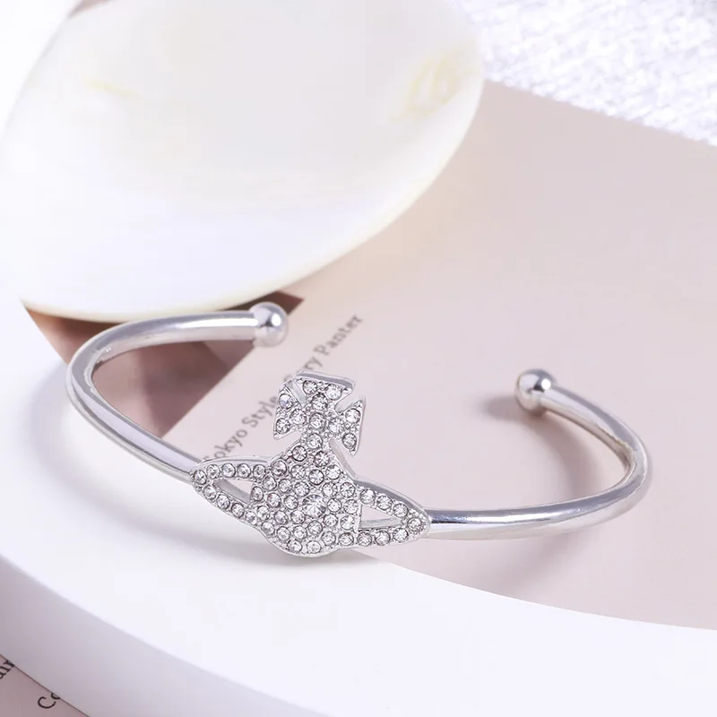 

Planet Inlaid Zircon Temperament Open Bracelet