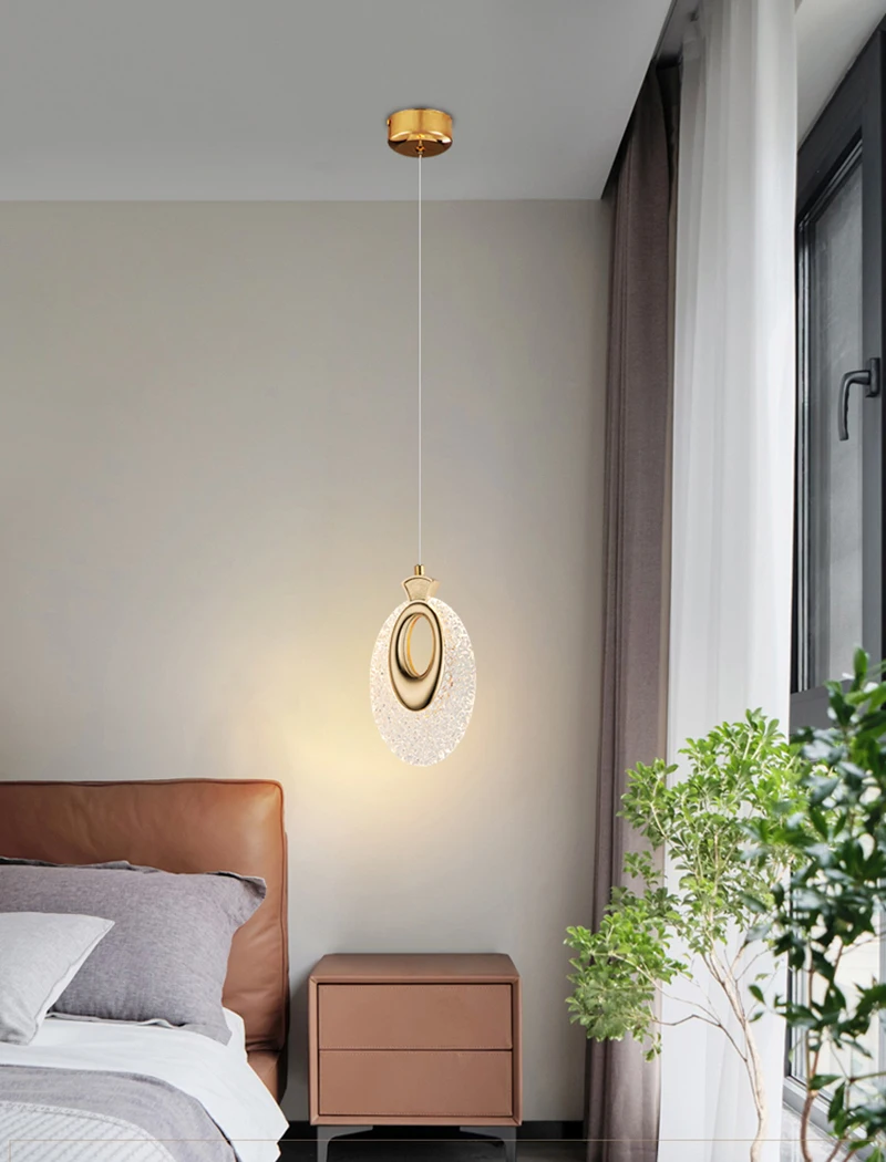 Name: Nordic pendant lampLight color: natural light (4000-6000k), 3 light colors (white light, natural light, warm light and other three light colors can be switched)Shade/Case Color: Gold BodyMaterial: acrylic + aluminum alloyDimensions: 20 x 20 x 10cm (A style), 14 x 22 x 10cm (B style),Cable length: 2 metersInput voltage: 90V-220VOperating power: 7 W • Colma.do™ • 2023 •