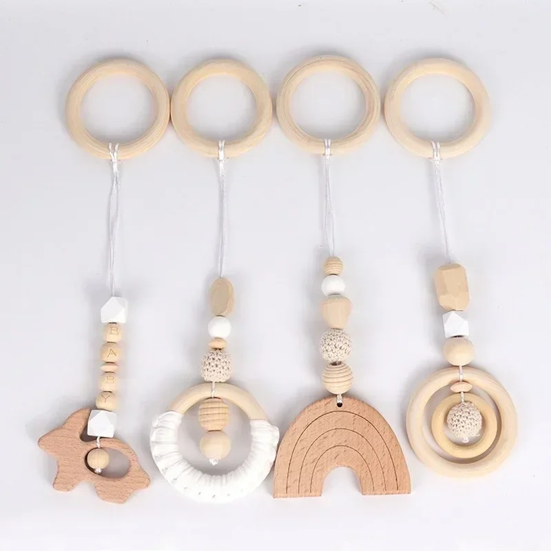 4PCS/Set Wood Teether Toddler Hanger Rattle Wood Ring Teething Toys For Newborn Baby Pram Toy Bebe Baby Play Gym Silicone Beads