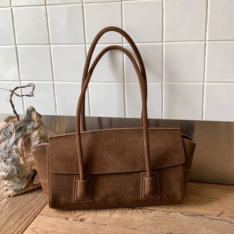 New 2026 Winter Spacious Trapeze Tote Euro American Style Matte Suede Leather Female Handbag Luxury Armpit Shoulder Bag