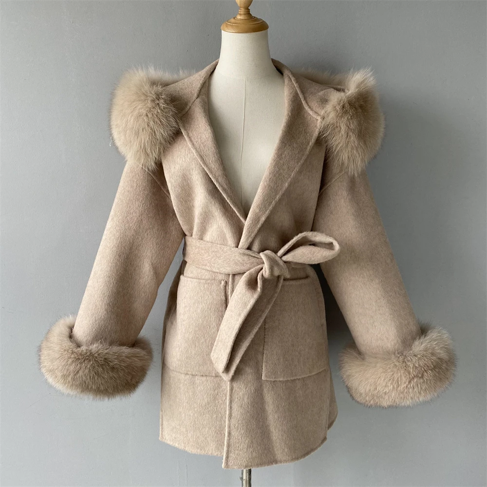 Women's cashmere coat with fox fur hood - side profile view