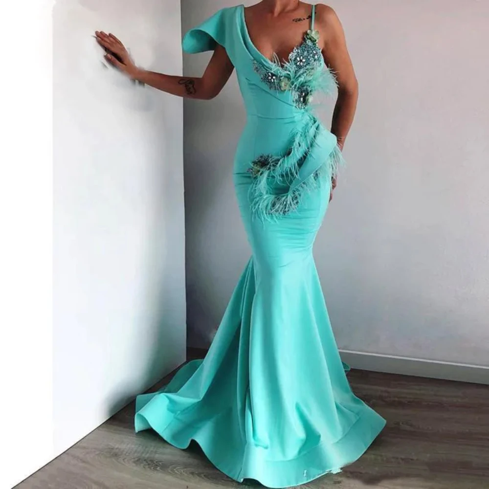 

Turquoise Evening Dresses Mermaid 2024 V-neck Feather Crystals Islamic Dubai Saudi Arabic Party Dresses Long Formal Prom Gowns