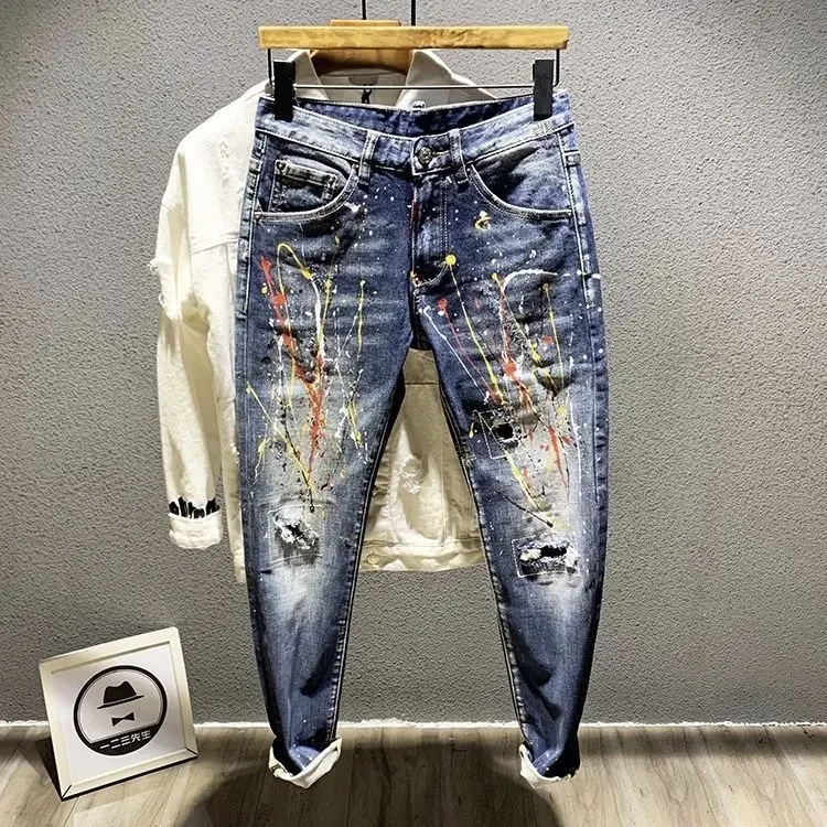 thumbnail image 1 of Pantalones vaqueros con bolsillos recortados de estrellas para hombre, pantalones vaqueros masculinos con gráficos, azul claro, venta al por mayor, alta calidad, estilo retro, informal, tallas XS, 1 of 5